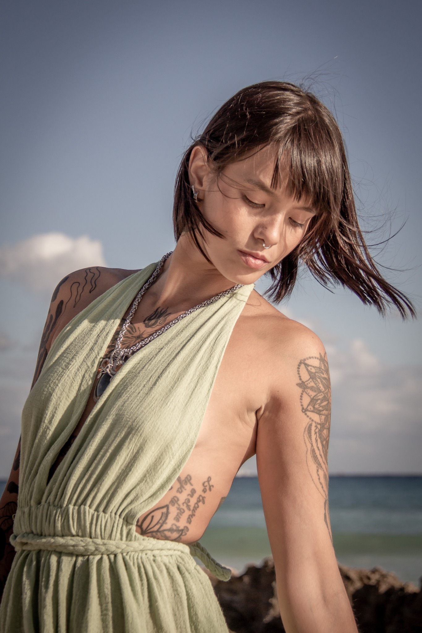Woman wearing a flowing Cefiro design